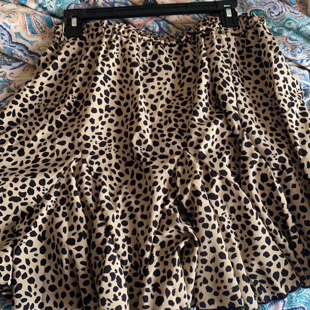 Tan and black Cheetah print skirt. Never worn